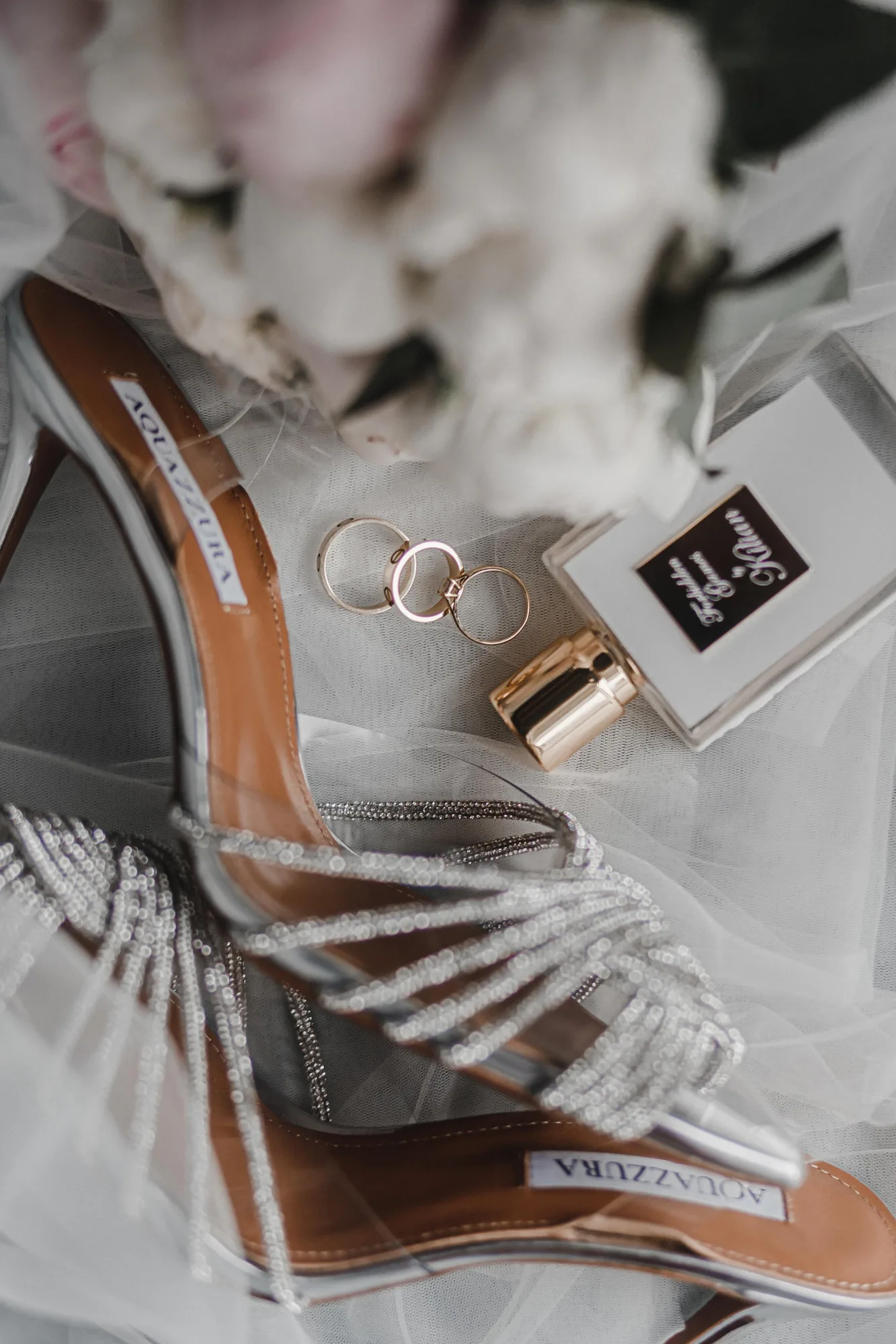 Wedding rings and bridal details from the wedding of E and S